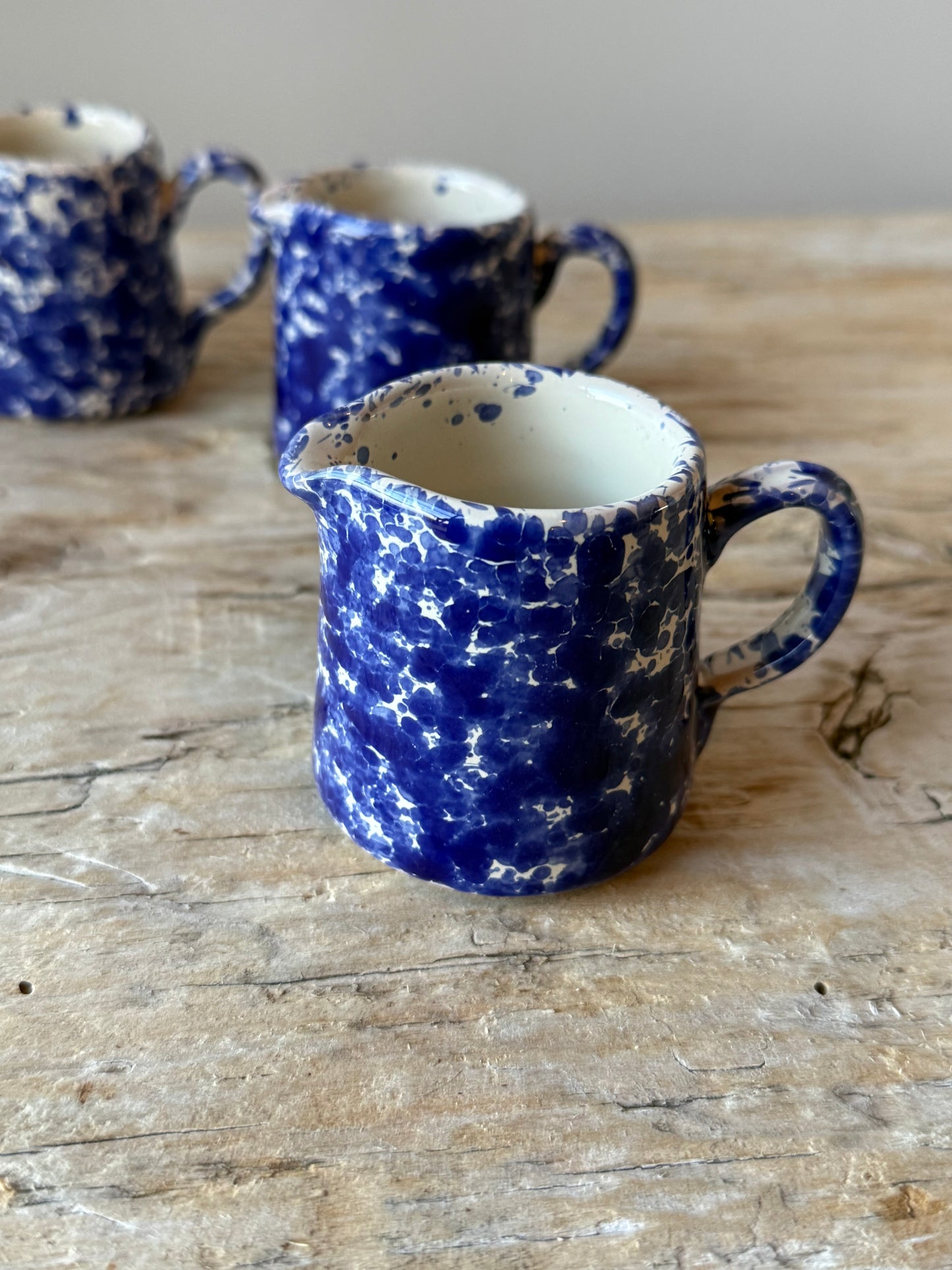 Dark blue splatterware small creamer jug