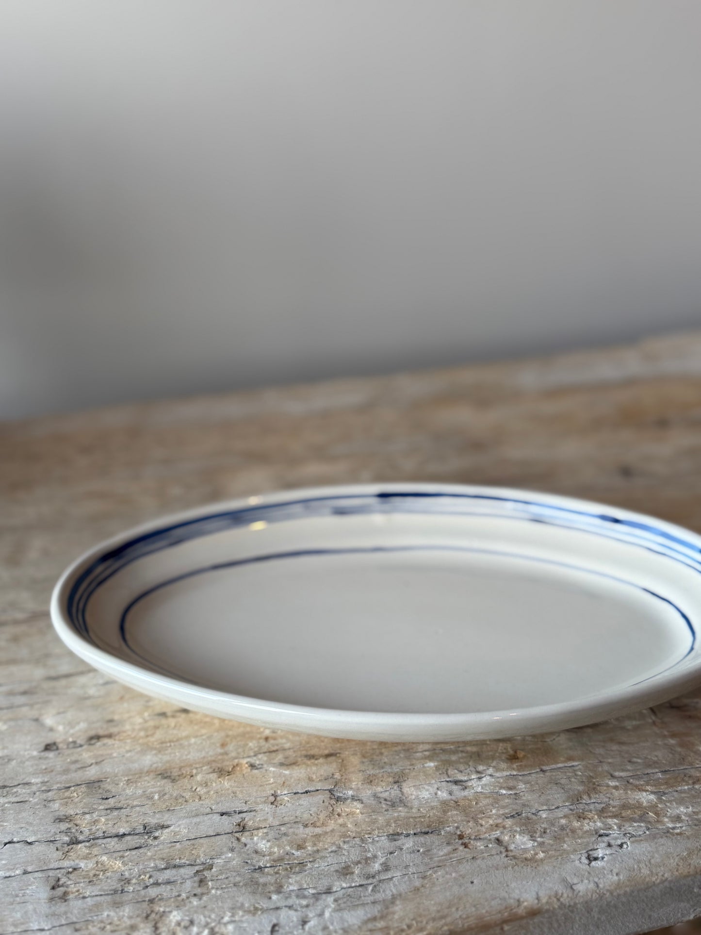 Cream with blue stripe small platter plate