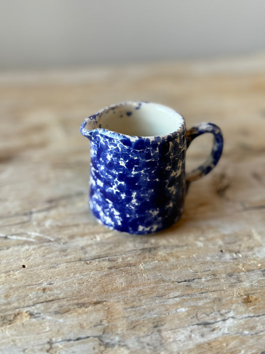 Dark blue splatterware small creamer jug