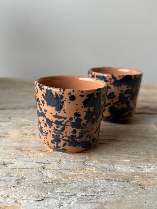 Pale terracotta & navy splatterware beaker