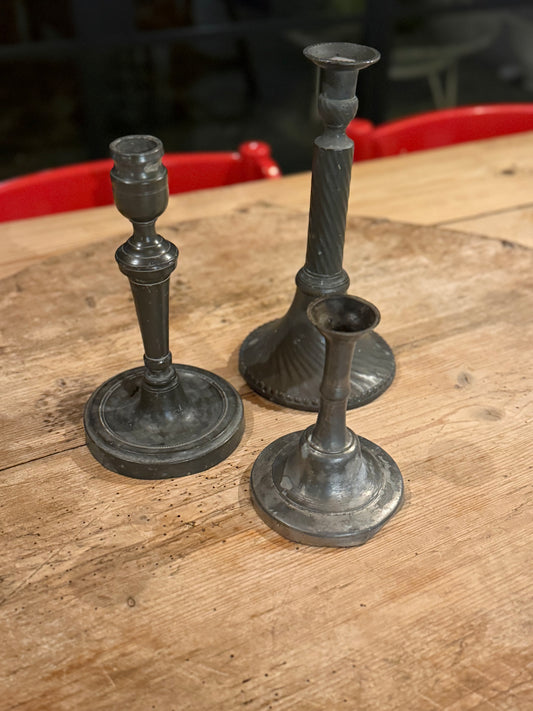 Trio pewter candle sticks